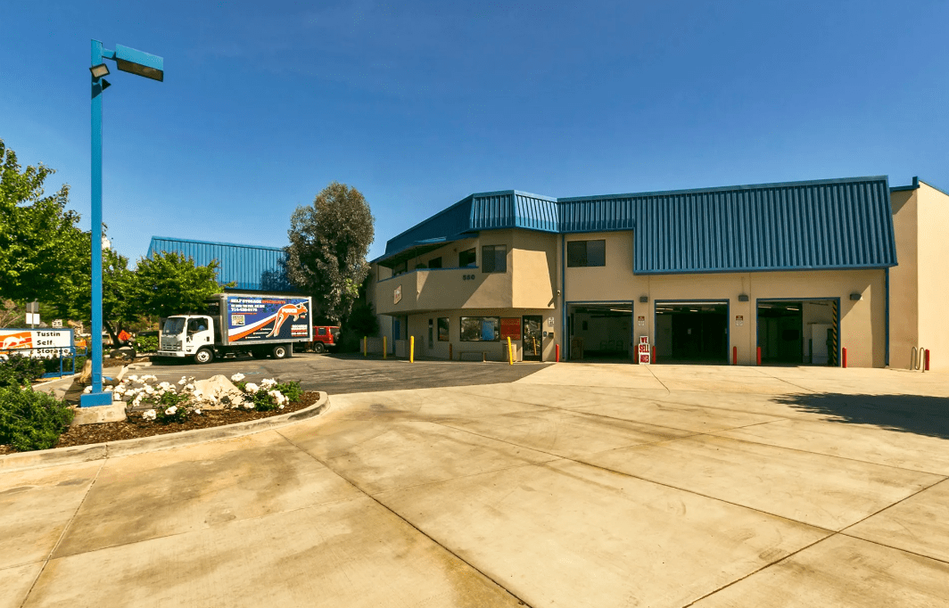 Pouch Self Storage Facility with a delivery truck in the parking lot 5.   Businessfiles,jpg – Boxes sitting on a cart in the hallway of a storage facility, in the process of transferring business files to self storage